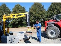 Pose bordure sur chantier Manitou